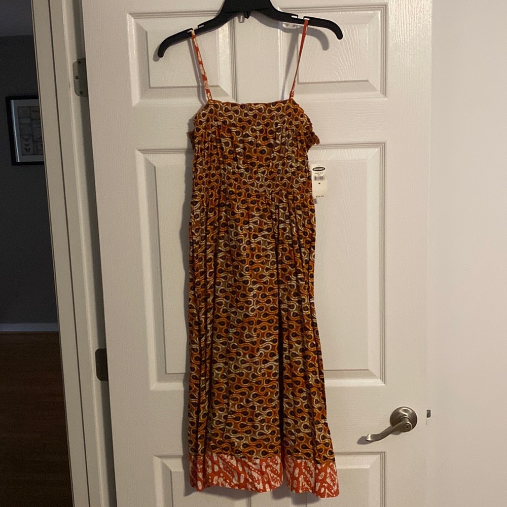 Womens Spaghetti strap orange pattern dress. Size medium
